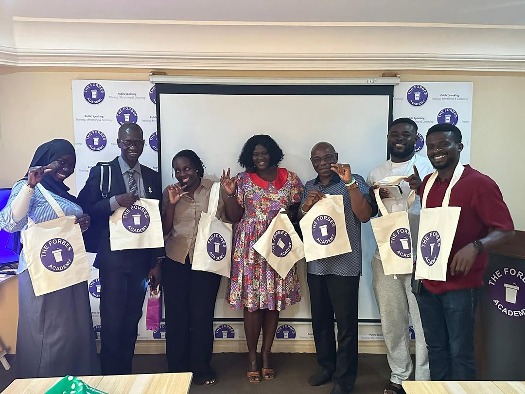 Graduating cohort with TFA tote bags